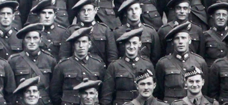 Close up black and white photograph of three rows of soldiers, Formal photograph in military uniform