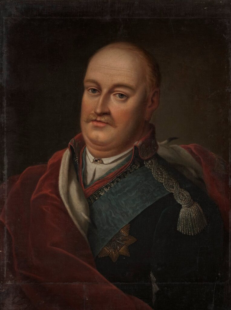 A colour oil portrait of a man with moustache and receding hairline. Dressed with white shirt and dark jacket with a red cloak over his right shoulder